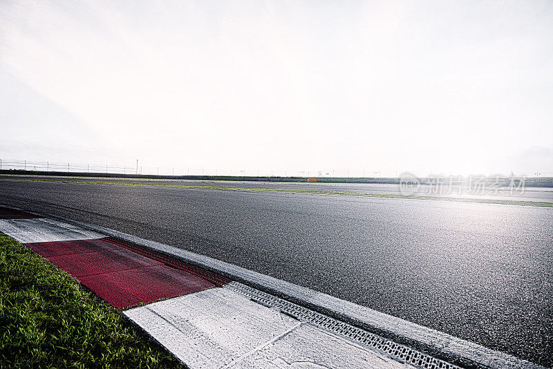 Empty Racing Track With Sunlight